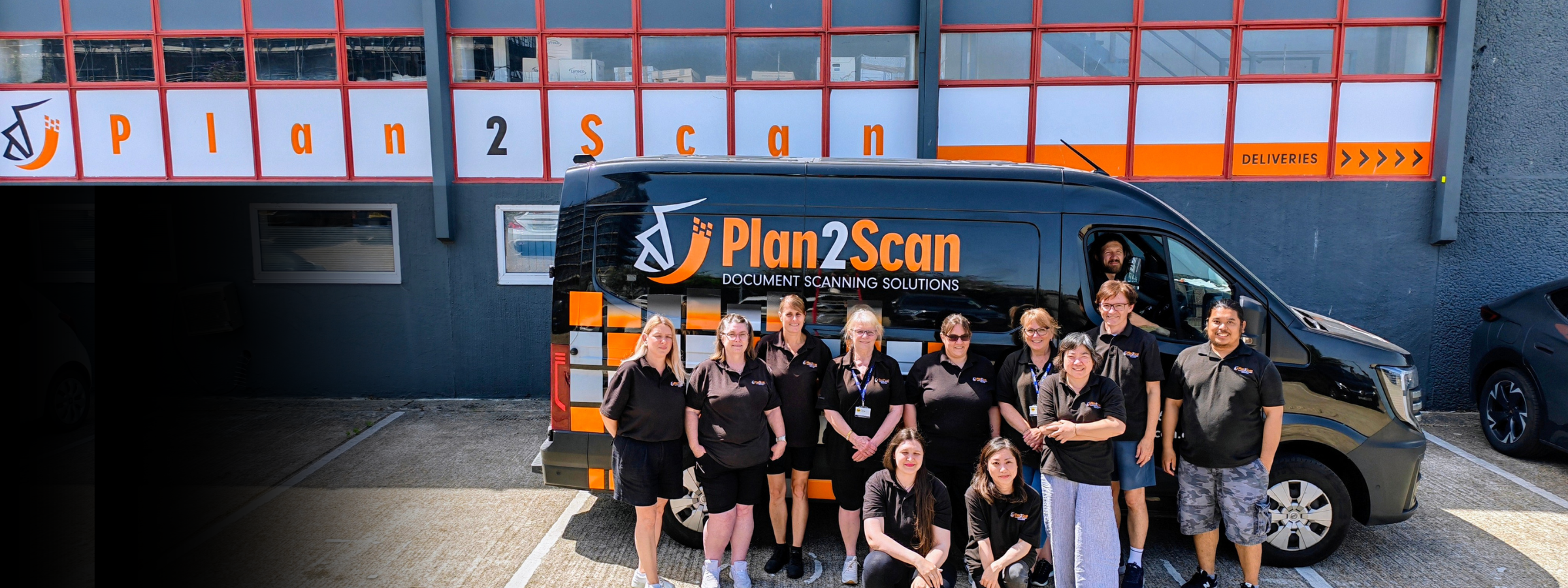 Plan 2 Scan team photo and branded van